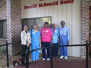 Cynthia Mingo and friends pose outside the Ronald McDonald House